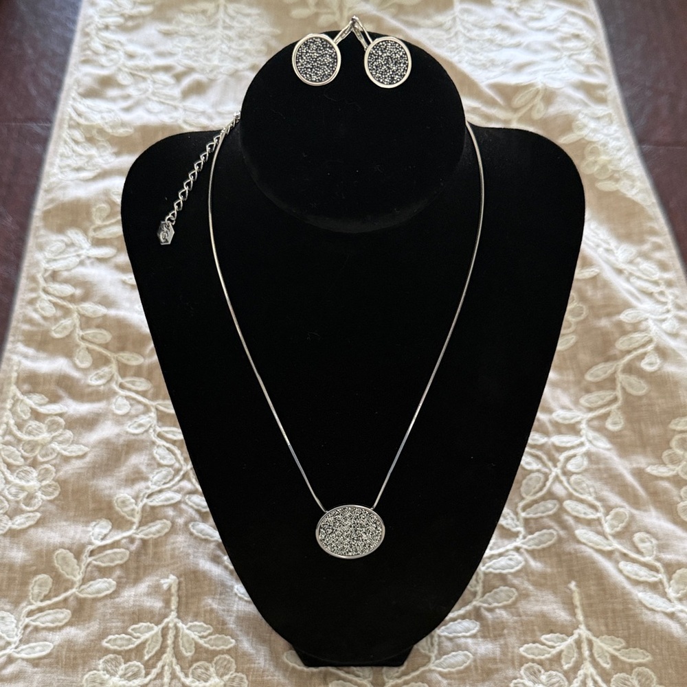 Touchstone Crystal necklace and earring set. Black and silver tones